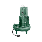 Green cast iron submersible effluent pump with carrying handle, discharge port, and attached power cord.