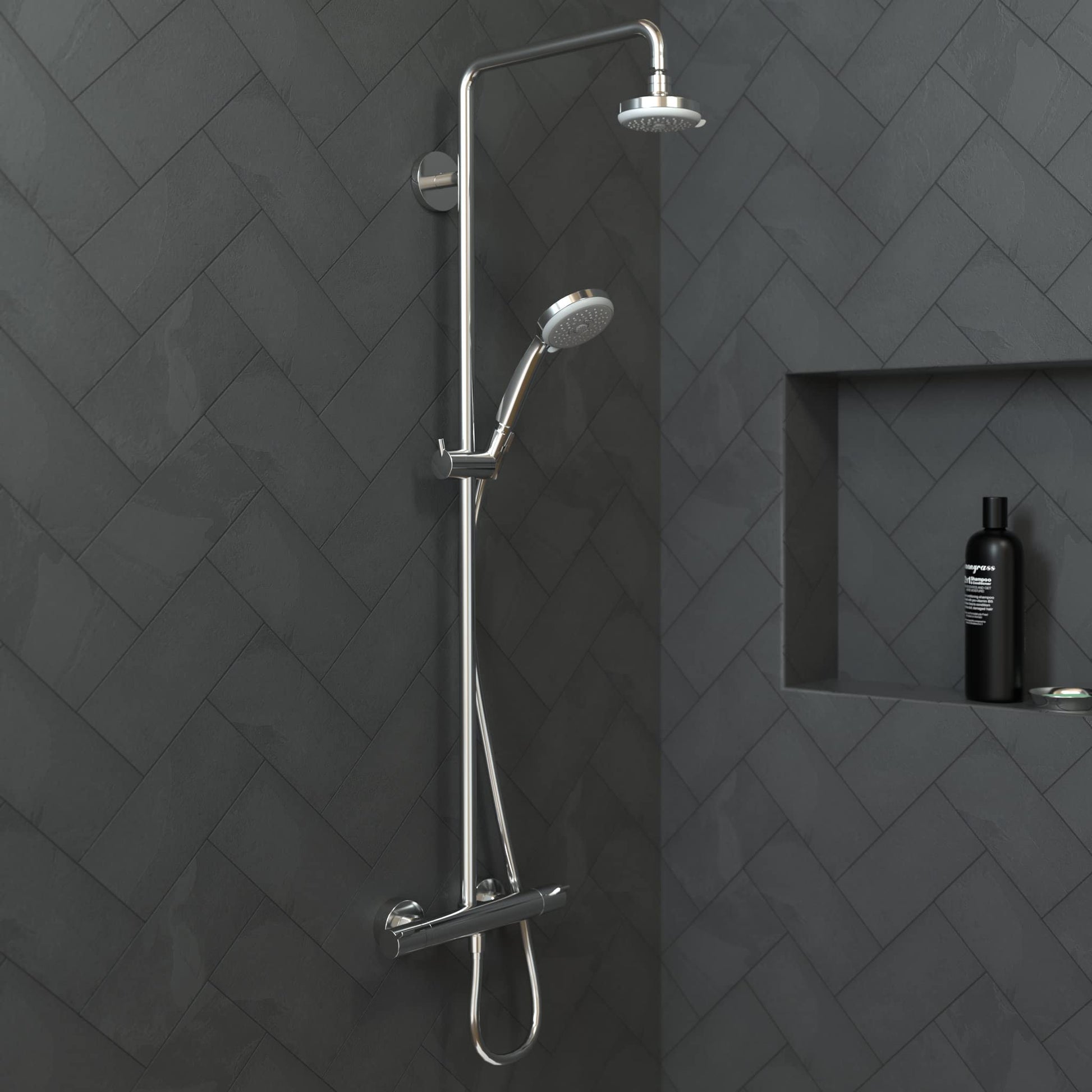 Chrome shower system with overhead rainfall head and handheld wand mounted on wall.