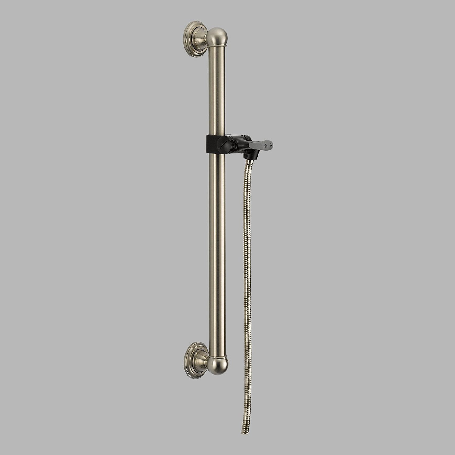 Brushed nickel vertical slide bar with wall mounts, adjustable hand shower holder, and connected hose.