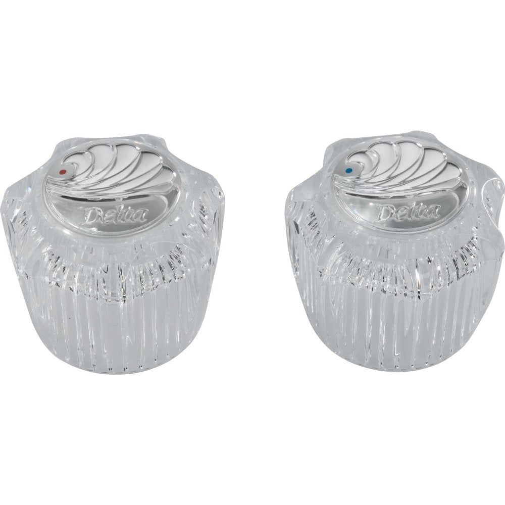 Pair of clear knob handles with ridged texture and metal lever tops, one with red indicator dot and one with blue indicator d