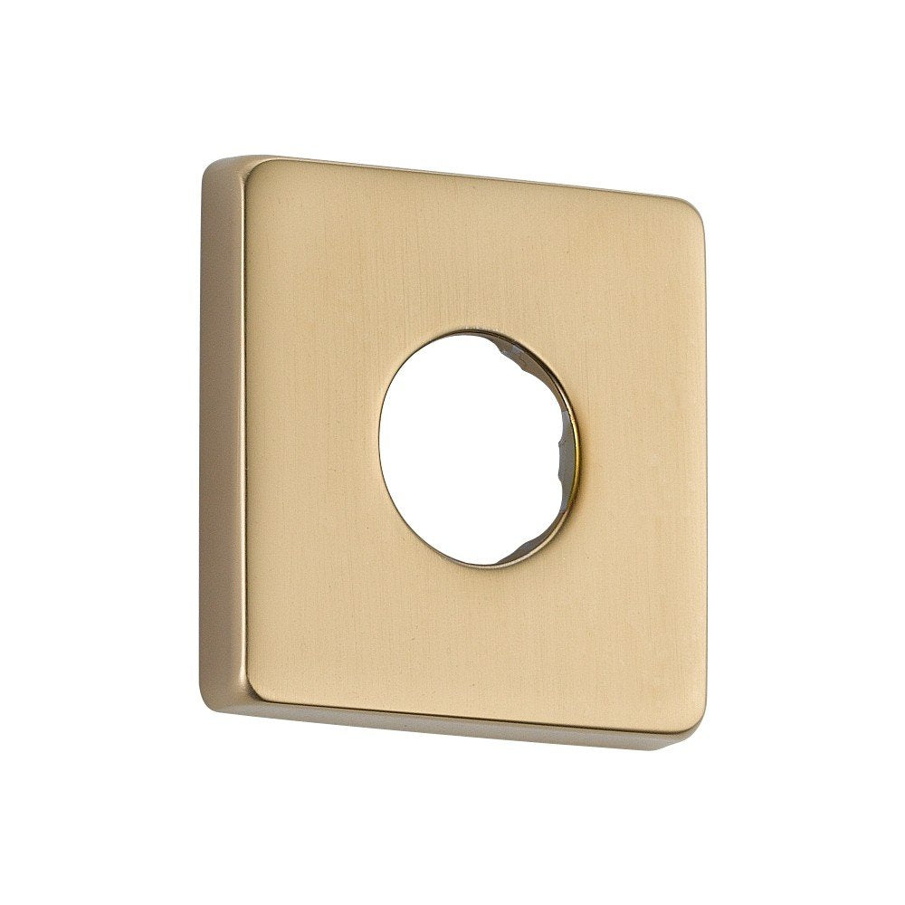 Champagne bronze square shower flange with centered circular opening and brushed metal finish.