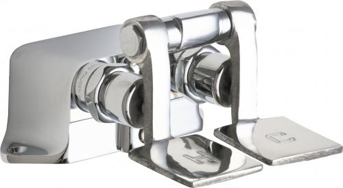 Chrome pedal valve faucet with two foot pedals and dual water outlets mounted on a flat base.