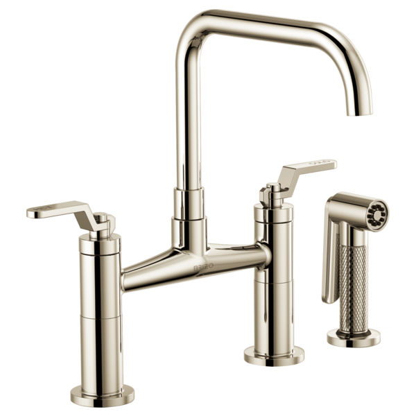Polished nickel bridge faucet with tall square spout, dual lever handles, and side sprayer.