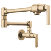 Gold wall-mounted pot filler faucet with articulating arm and lever handle in luxe gold finish.