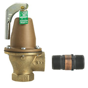 Bronze boiler pressure relief valve with curved outlet pipe, green label tag, and separate flood sensor connector with copper