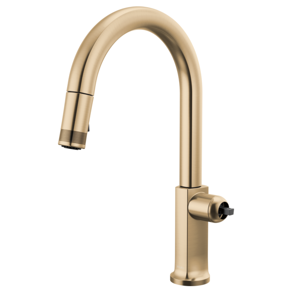 Brizo Kintsu pull-down kitchen faucet with arc spout in brushed gold finish, shown with spray head retracted.