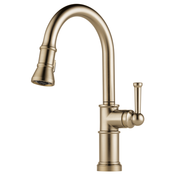 Brushed brass single-handle kitchen faucet with curved spout and pull-down spray head.
