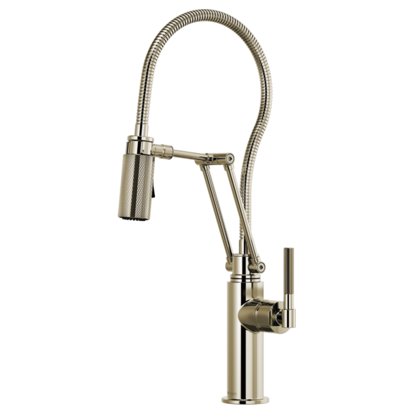 Chrome kitchen faucet with articulating spray hose, knurled handle, and cylindrical spout on tall base.