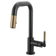 Matte black pull-down kitchen faucet with luxe gold knurled handle and square spout.
