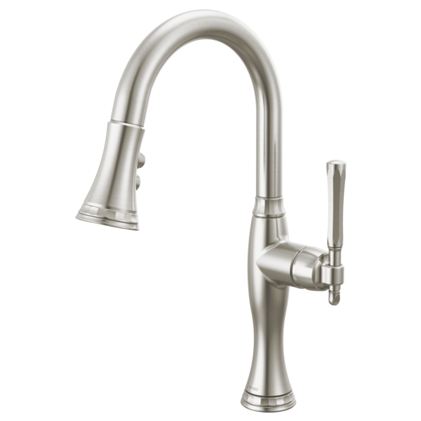 Stainless steel pull-down kitchen faucet with curved spout, single lever handle, and spray head in pulled-down position.