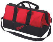 Red and black contractor bag with dual handles, shoulder strap, and Milwaukee logo on front.