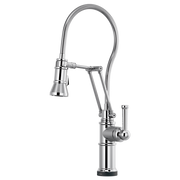 Chrome kitchen faucet with articulating spray head and flexible hose.