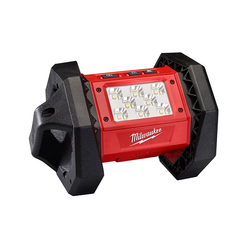 Red and black Milwaukee M18 LED flood light with multiple white LED bulbs and fold-out handles on sides.