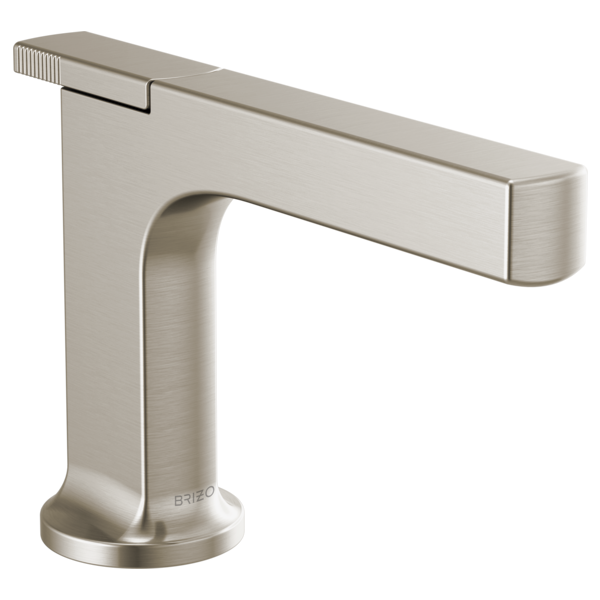 Brushed nickel single-handle lavatory faucet with angular spout and cylindrical base.
