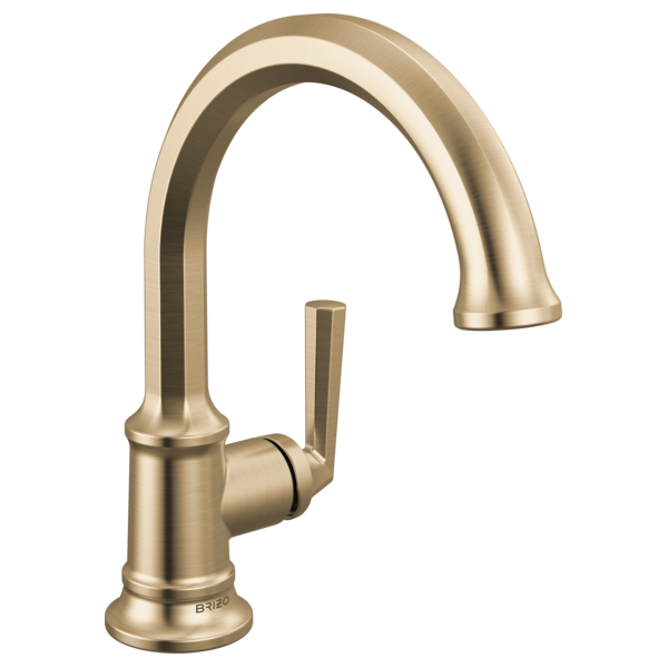 Luxe gold single-handle bathroom faucet with curved spout and cylindrical handle.