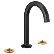 Matte black arc spout faucet with two brass circular base mounts for widespread lavatory installation.