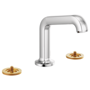 Chrome widespread lavatory faucet with angled spout and brass circular handles on white background.