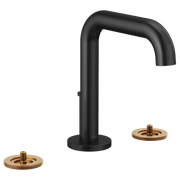 Matte black widespread lavatory faucet with high curved spout and two brass valve escutcheons.