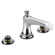 Chrome three-piece widespread lavatory faucet with tapered spout and round base handles.