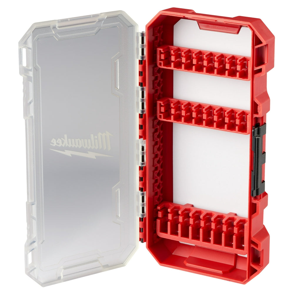 Red Milwaukee compact case with clear lid, open to show three rows of red storage compartments for accessories.