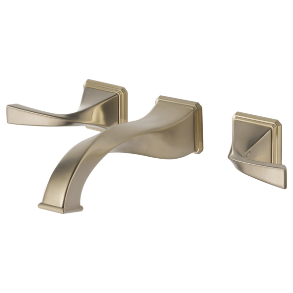 Brushed gold wall-mounted faucet with curved spout and two lever handles on square rosettes.