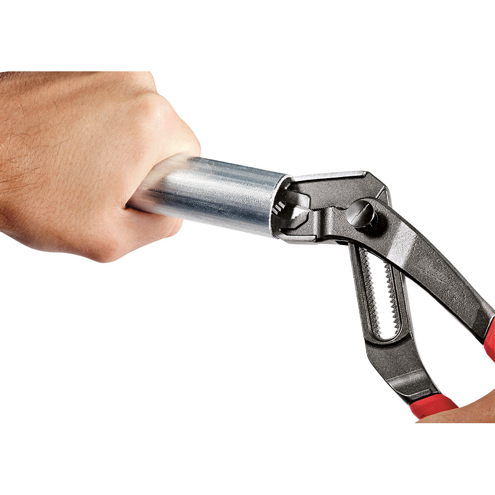Milwaukee hex-jaw pliers with metal head and red grip handles held in hand against white background.