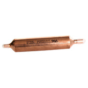 Copper cylindrical drier with connector ports at both ends and model specifications stamped on the body.