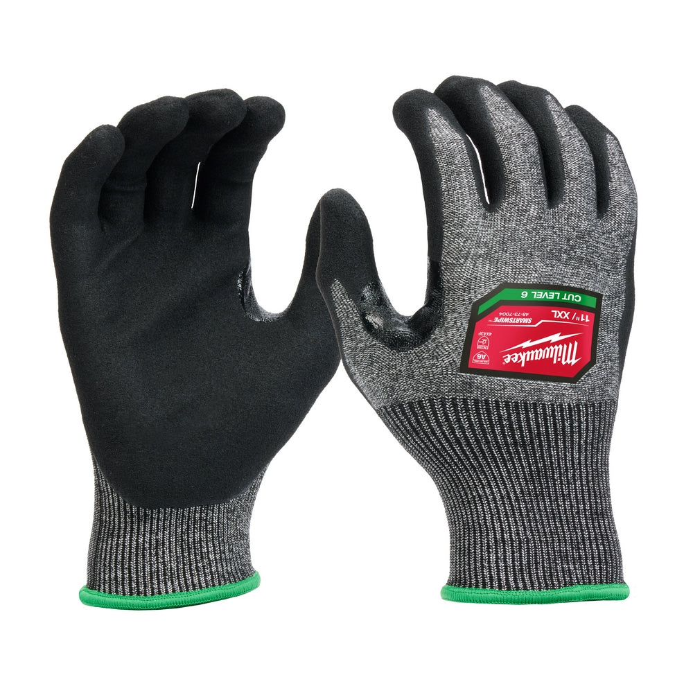 Gray and black nitrile-dipped work gloves with green wrist cuff and Milwaukee label on back of hand.