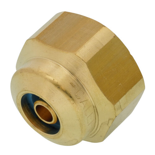 Brass PEX fitting with hexagonal nut and copper insert on angled view.