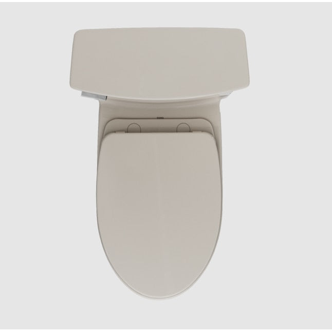 Sedona beige one-piece elongated toilet with closed soft-close seat, viewed from above against a gray background.