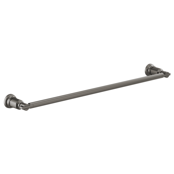 Chrome towel bar with decorative end caps mounted horizontally on wall.