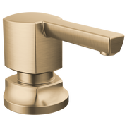 Brizo Kintsu soap and lotion dispenser in brushed gold finish with cylindrical pump and curved spout.