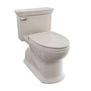 Sedona beige one-piece elongated toilet with soft-close seat and tank handle.