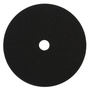 Black foam cutting pad with center hole, 6 inches in diameter.