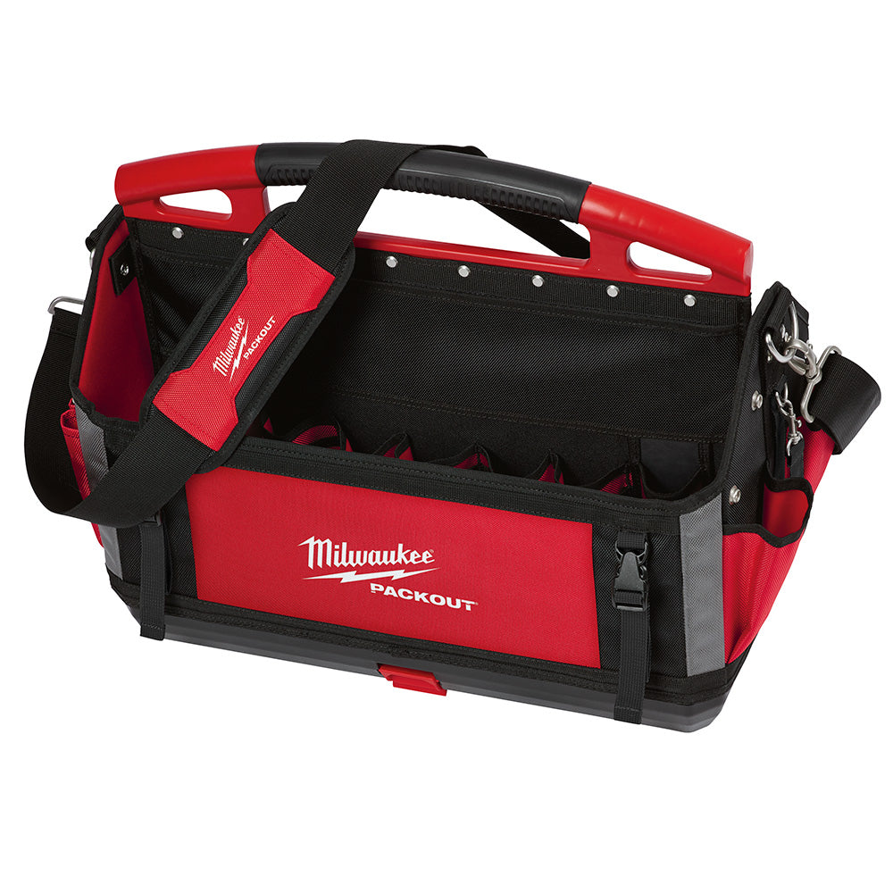 Red and black Milwaukee PACKOUT tote with padded handles, interior compartments, and side pockets.