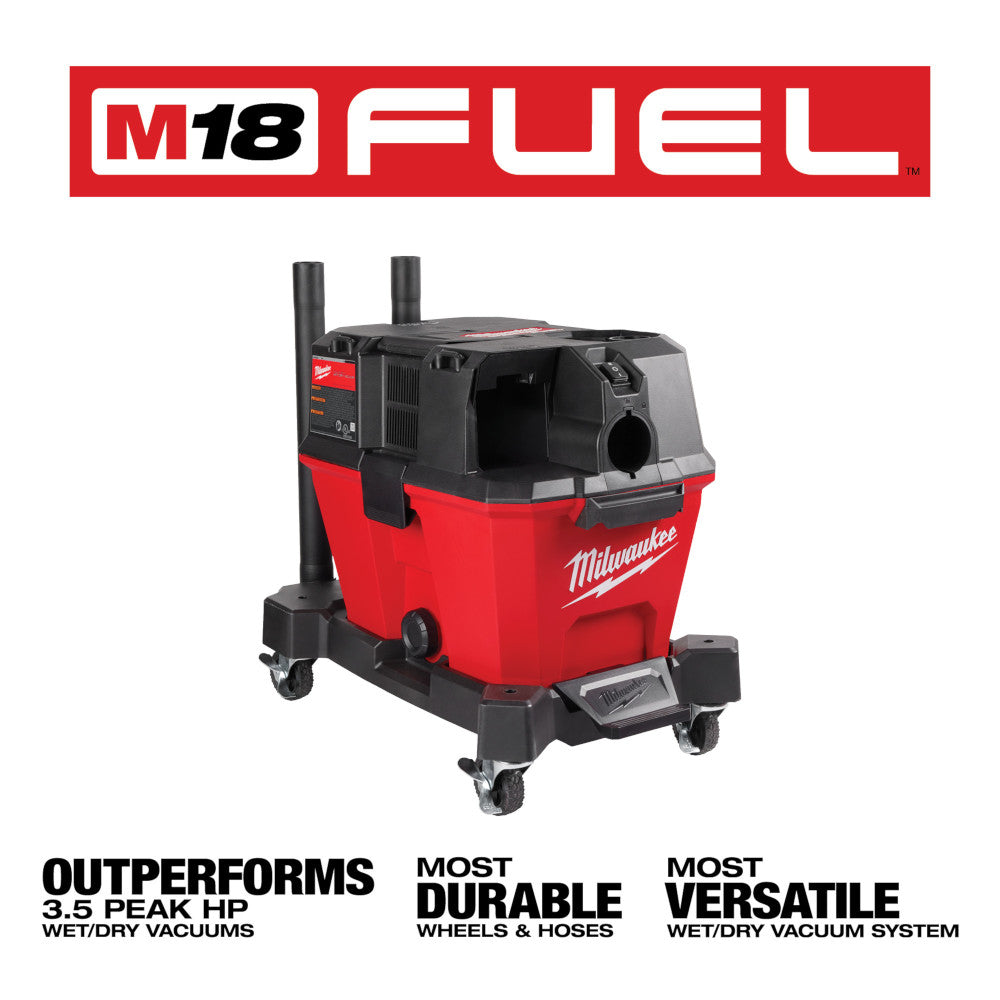 Red and black Milwaukee M18 FUEL wet/dry vacuum with dual exhaust tubes and caster wheels on white background.