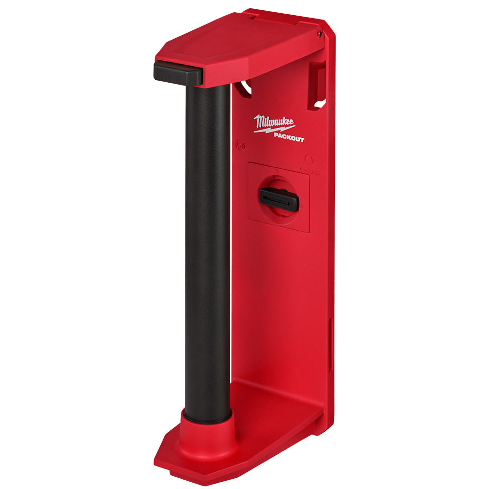 Red and black Milwaukee PACKOUT roll holder with cylindrical dispenser and mounting bracket.