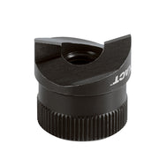 Black metal sink punch tool with cylindrical body, ridged grip base, and curved cutting head with center hole.