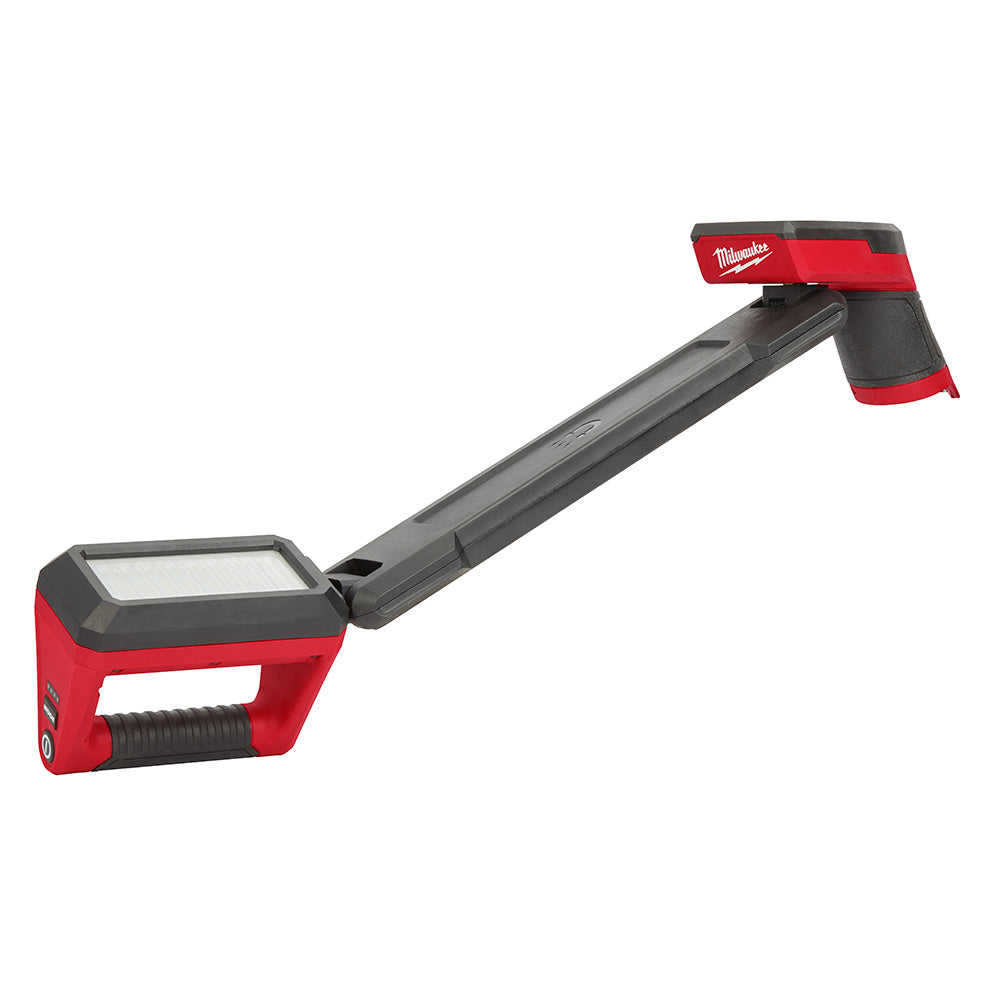 Milwaukee M12 underbody light with red and black housing, articulated arm, and rectangular LED panel head.