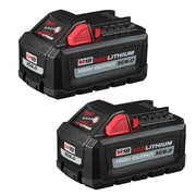 Two black and red Milwaukee M18 REDLITHIUM HIGH OUTPUT XC6.0 battery packs with charging contacts and status indicators.