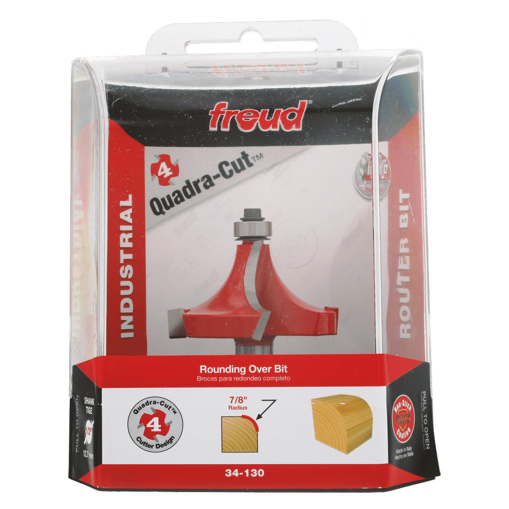 Freud 34-130 rounding over bit with 7/8" radius in clear clamshell packaging, showing red router bit and wood sample.