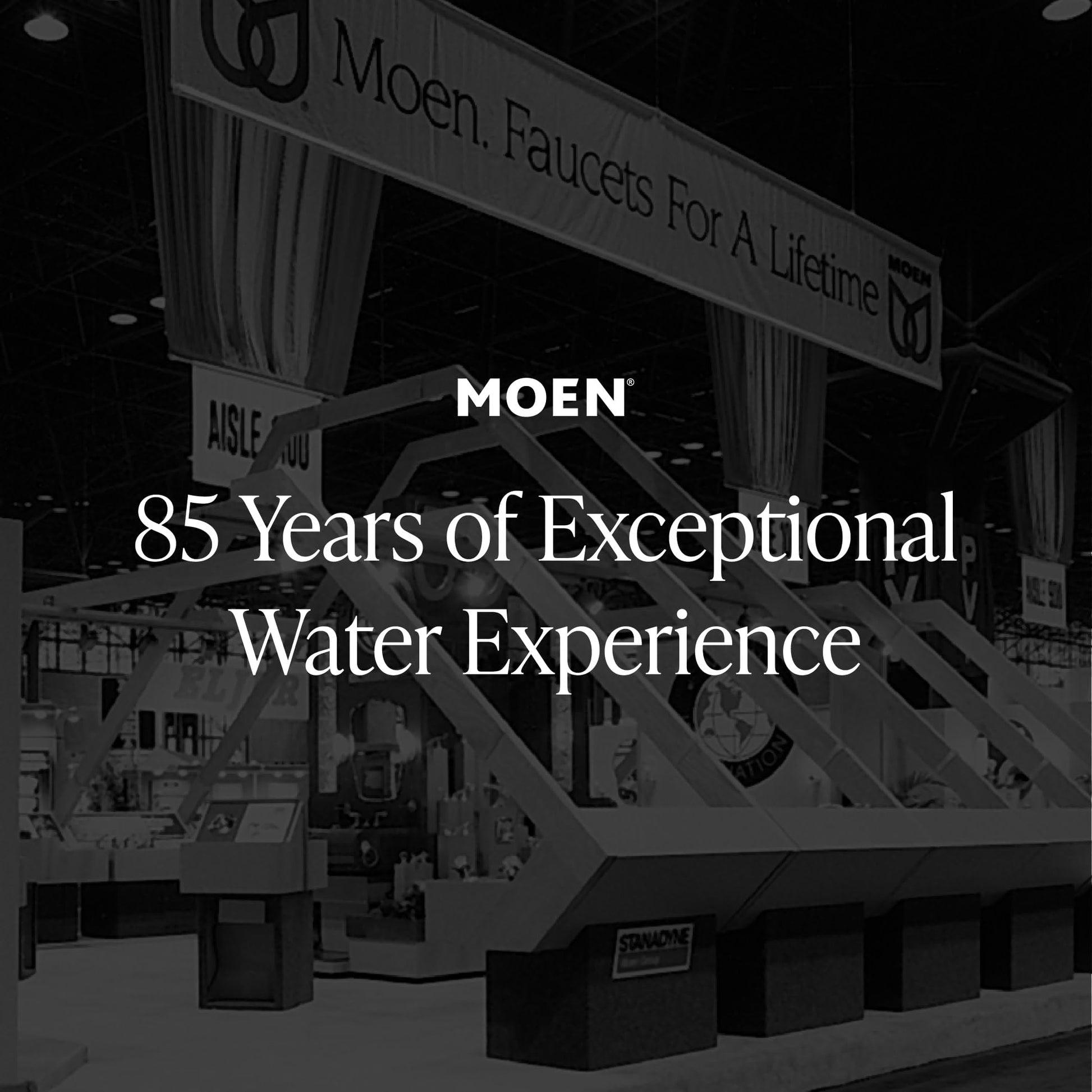 Moen branded trade show display booth with signage and product exhibits.