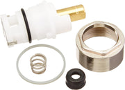 Delta Talbott faucet repair kit with white stem unit, brass fitting, metal bonnet nut, spring, seat, and washers.