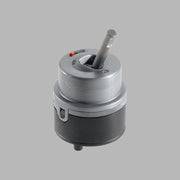 Delta RP50587 cartridge with silver and black cylindrical body, center stem, and red indicator button on top.