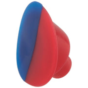 Red and blue dual-colored button with curved, rounded shape and textured surface.