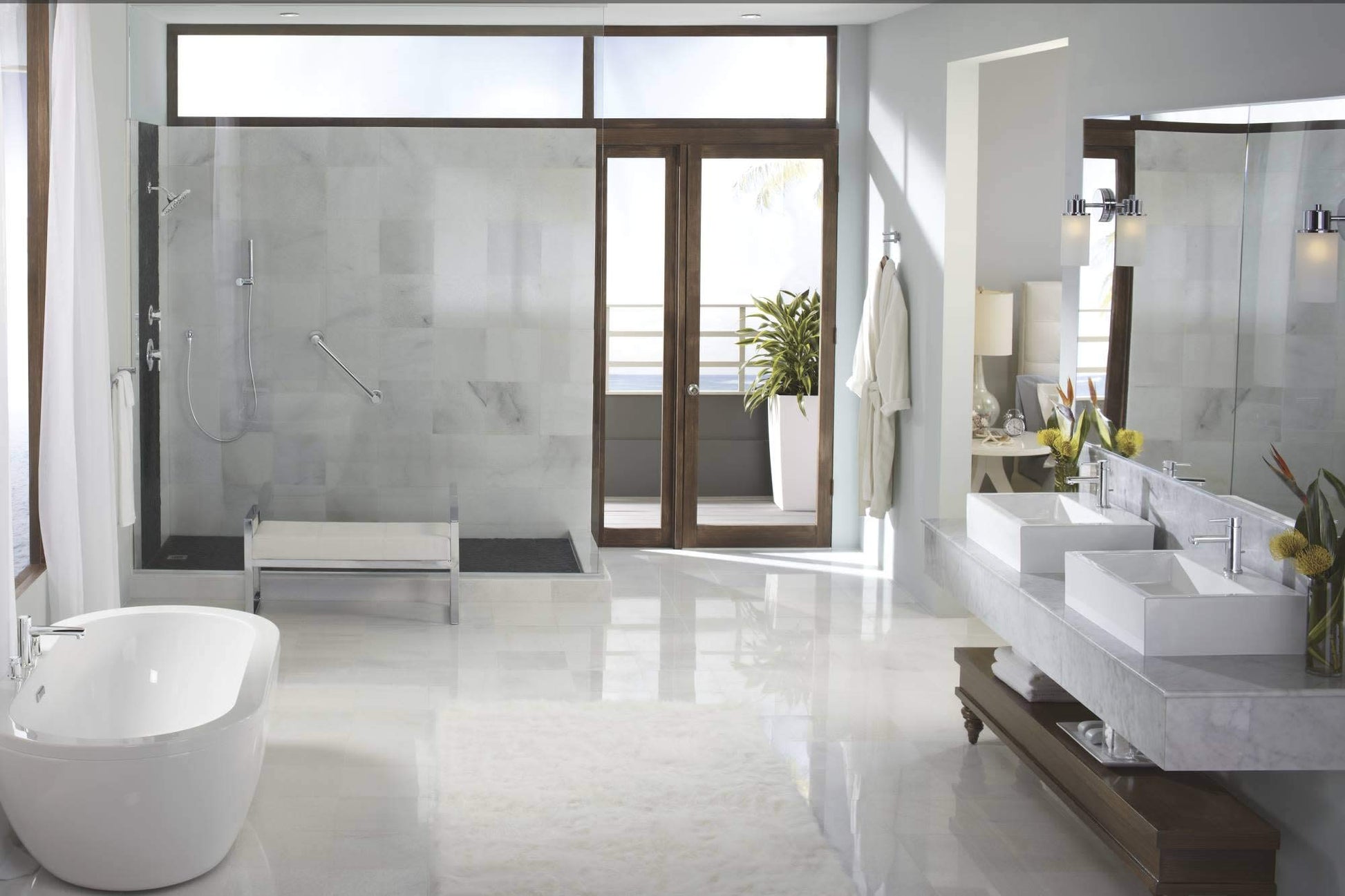 Brushed gold 24-inch stainless steel grab bar mounted horizontally on shower enclosure wall in modern bathroom.