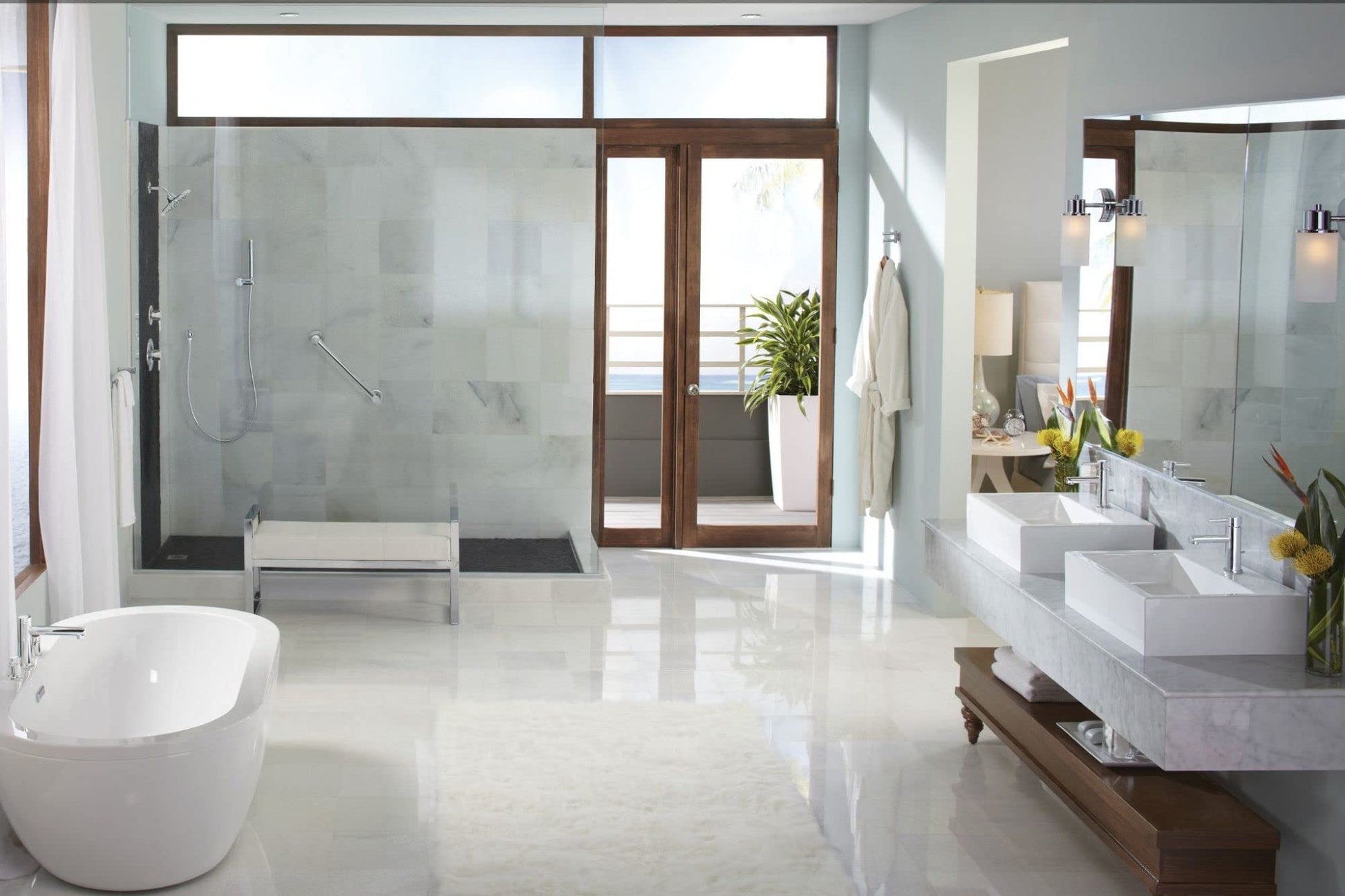 Chrome grab bar mounted horizontally on bathroom wall near shower enclosure.