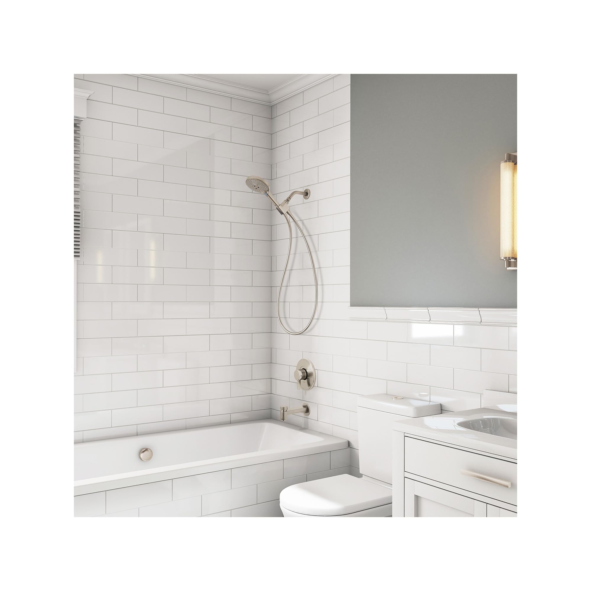 Brushed nickel handheld shower head with curved arm mounted above white subway tile bathtub surround.