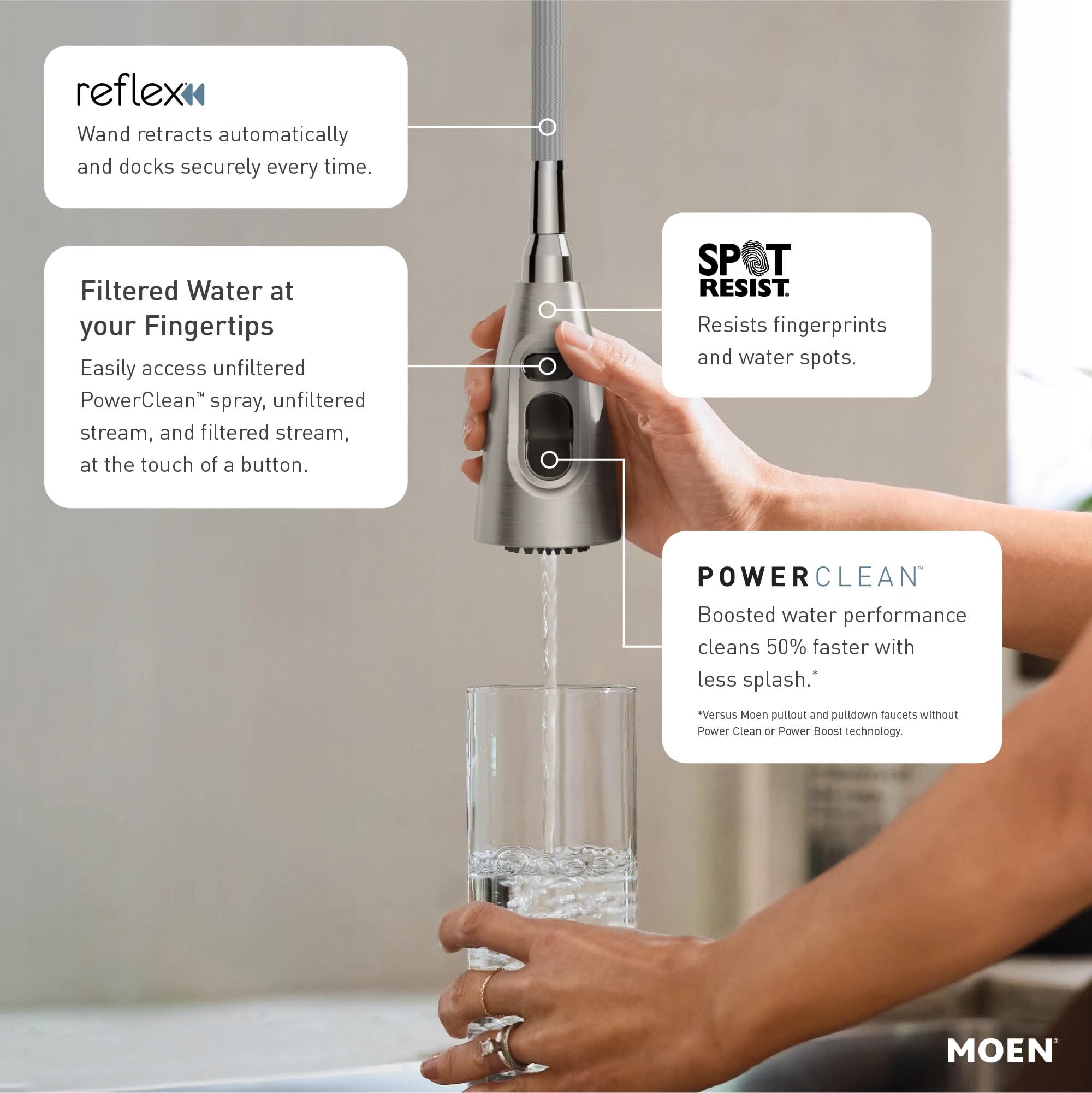 Moen Paterson stainless steel pulldown kitchen faucet with high arc spout being used to fill a glass of water.