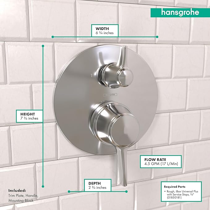 Chrome round pressure balance valve trim with upper diverter lever and lower control handle mounted on white subway tile.